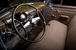 Oldsmobile Six Touring Sedan 1938 года